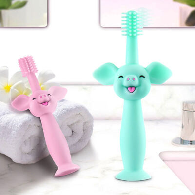 acheter La brosse à dents pour bébés en silicone de qualité alimentaire Cartoon Pig Baby Teether Toy Soft Hair Oral Care Training Suction Base online manufacture