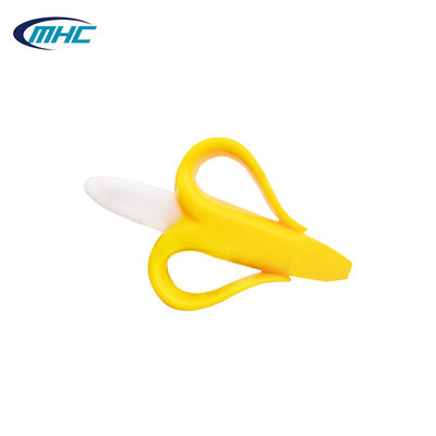 La brosse à dents molle Teether de banane de Teether de bébé non toxique de silicone a adapté aux besoins du client